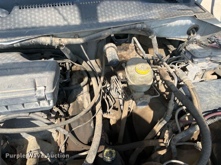 image for item NT9533 2001 Dodge Ram 3500  Quad Cab flatbed pickup truck