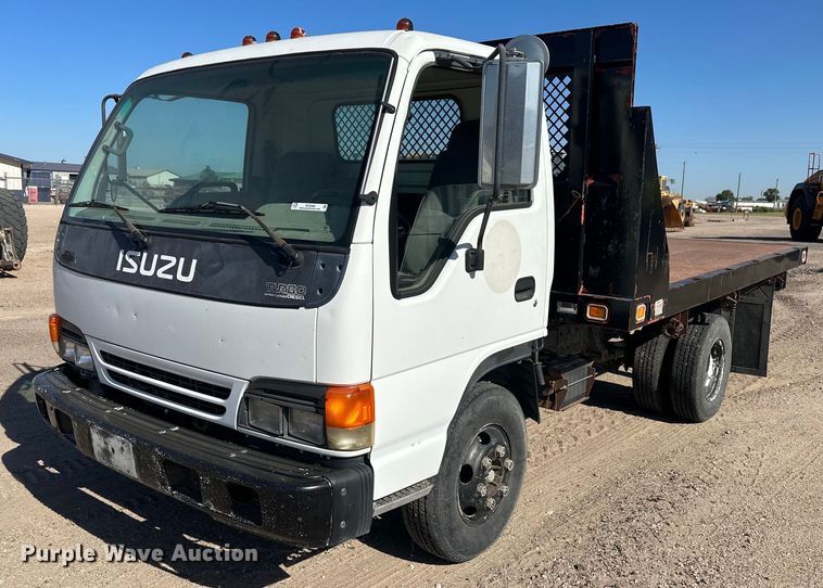 image for item OC9388 1999 Isuzu NPR  dump flatbed truck