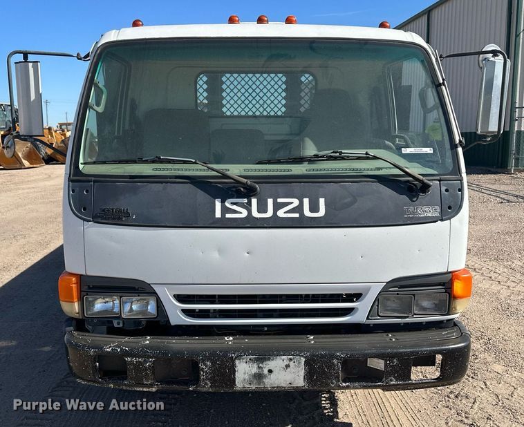 image for item OC9388 1999 Isuzu NPR  dump flatbed truck