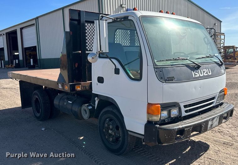 image for item OC9388 1999 Isuzu NPR  dump flatbed truck