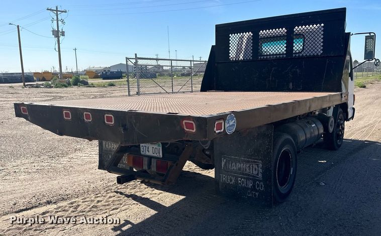 image for item OC9388 1999 Isuzu NPR  dump flatbed truck