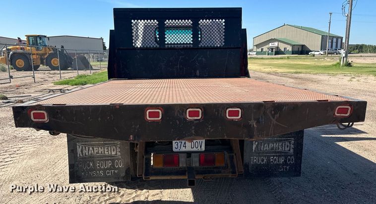 image for item OC9388 1999 Isuzu NPR  dump flatbed truck