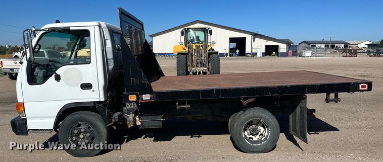 image for item OC9388 1999 Isuzu NPR  dump flatbed truck