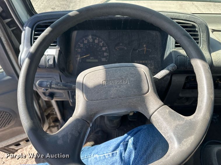 image for item OC9388 1999 Isuzu NPR  dump flatbed truck