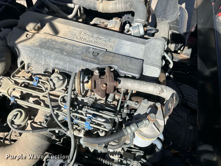 image for item OC9388 1999 Isuzu NPR  dump flatbed truck