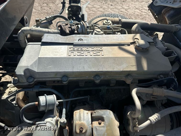 image for item OC9388 1999 Isuzu NPR  dump flatbed truck