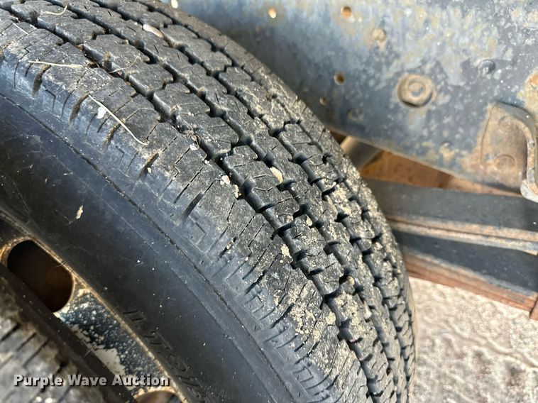 image for item OC9388 1999 Isuzu NPR  dump flatbed truck