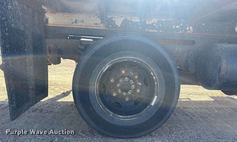 image for item OC9388 1999 Isuzu NPR  dump flatbed truck