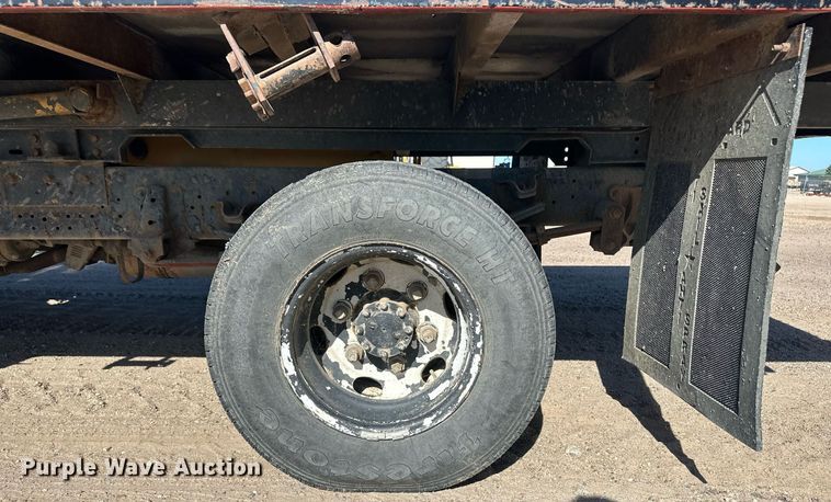 image for item OC9388 1999 Isuzu NPR  dump flatbed truck