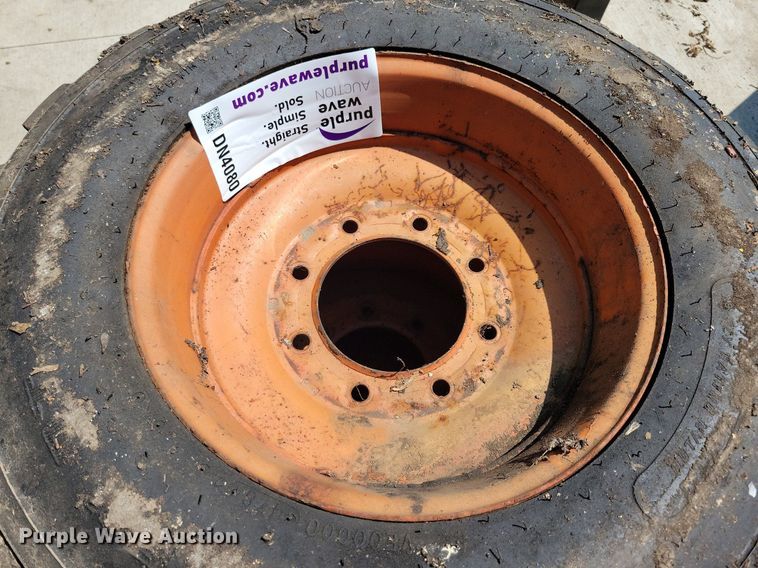 image for item DN4080 (4) 10-16.5 NHS Firestone skid steer tires and wheels