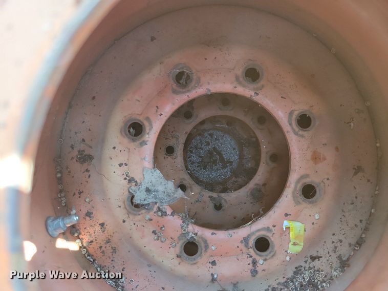 image for item DN4080 (4) 10-16.5 NHS Firestone skid steer tires and wheels