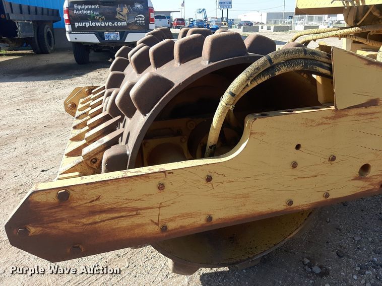 image for item DO3099 1989 Caterpillar CP-323 single drum vibratory roller