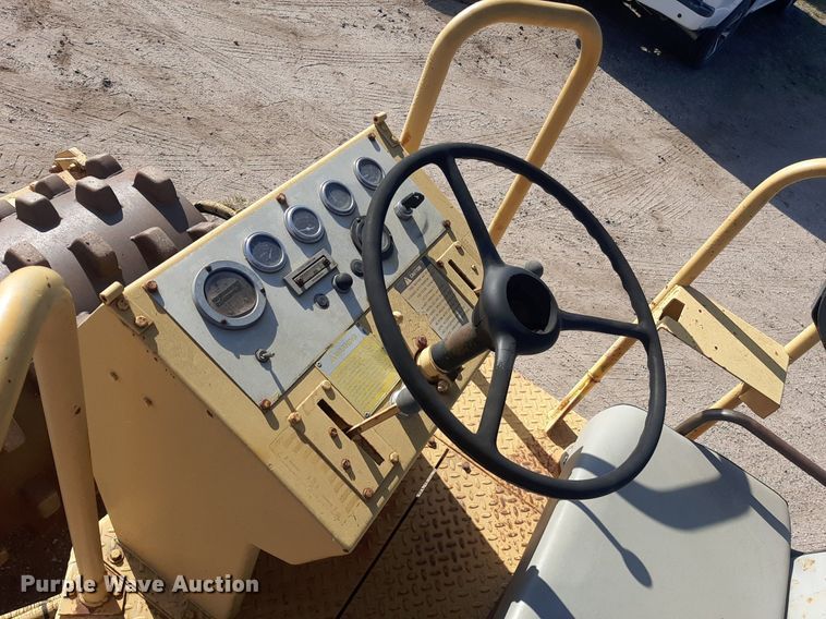 image for item DO3099 1989 Caterpillar CP-323 single drum vibratory roller
