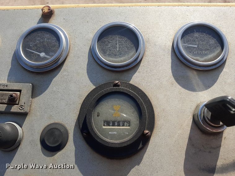 image for item DO3099 1989 Caterpillar CP-323 single drum vibratory roller