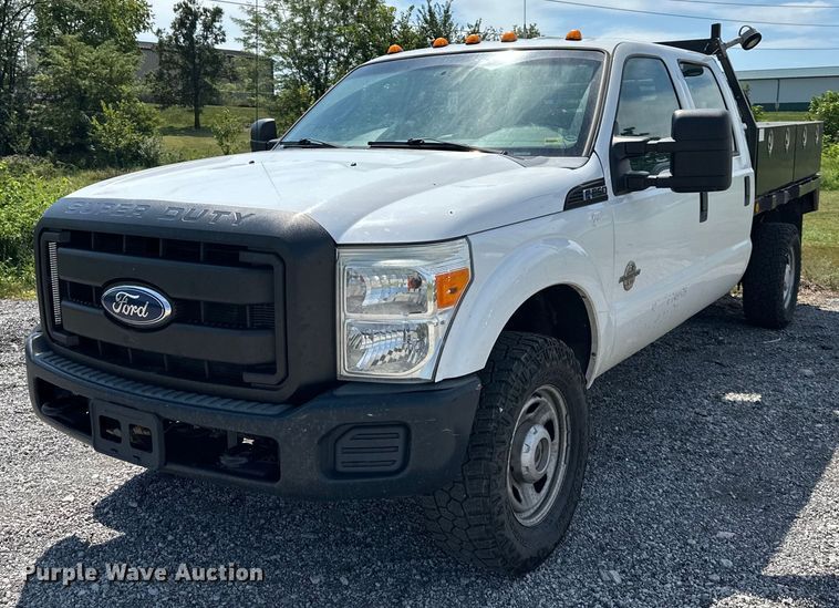 image for item DS2267 2012 Ford F250 Super Duty  Crew Cab flatbed pickup truck