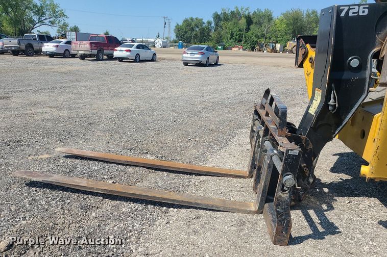 image for item JC9991 2018 Caterpillar TL1255D  telehandler