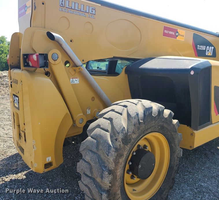 image for item JC9991 2018 Caterpillar TL1255D  telehandler