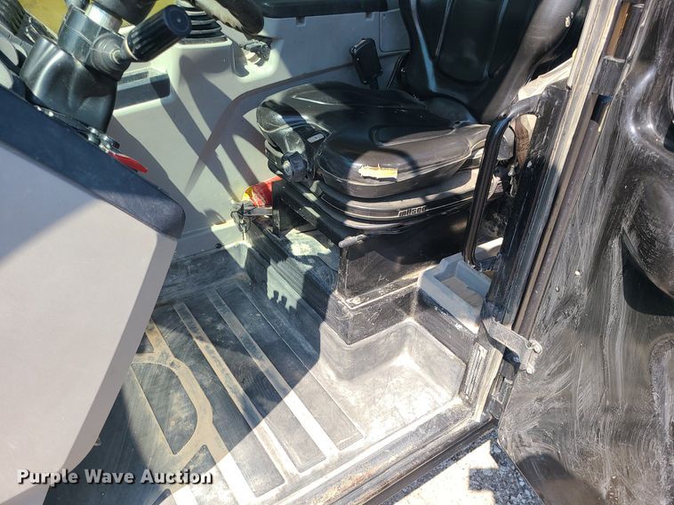 image for item JC9991 2018 Caterpillar TL1255D  telehandler