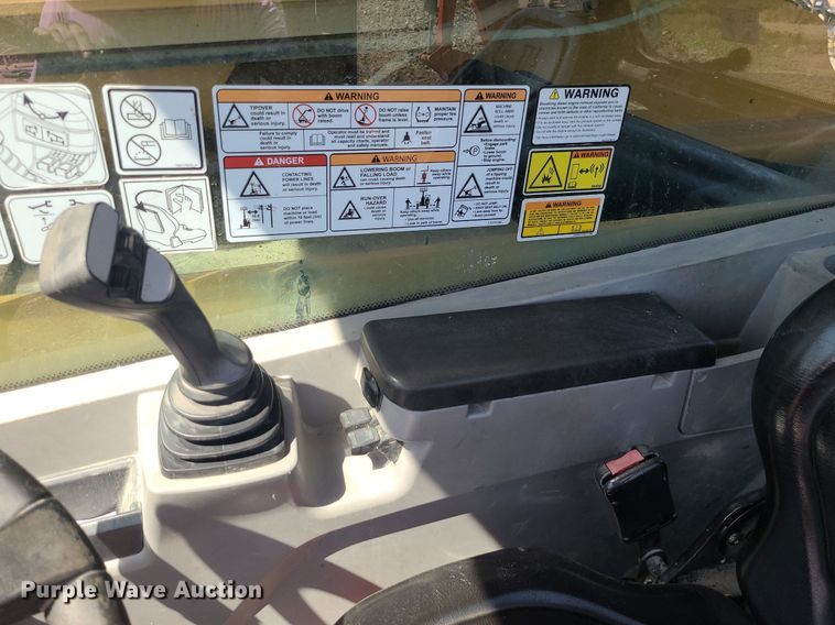 image for item JC9991 2018 Caterpillar TL1255D  telehandler