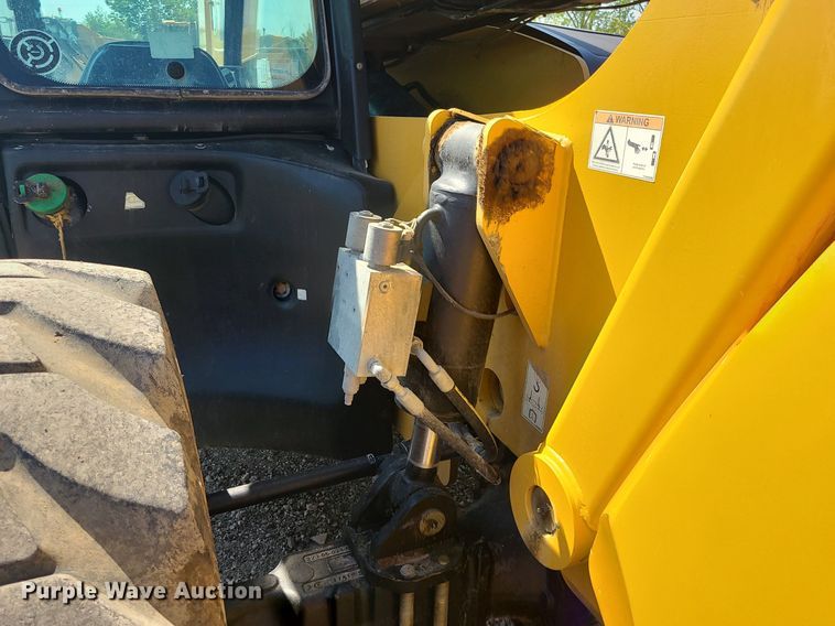 image for item JC9991 2018 Caterpillar TL1255D  telehandler