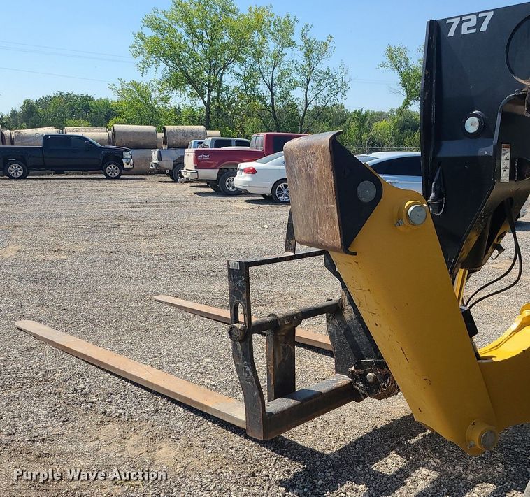 image for item JC9993 2017 Caterpillar TL1255D  telehandler