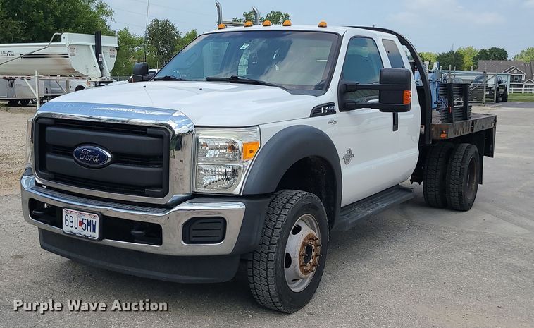 image for item JD9012 2015 Ford F450 Super Duty  SuperCab flatbed truck