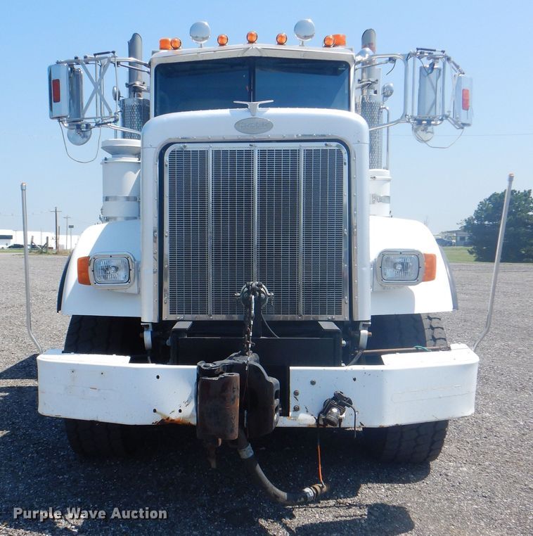 image for item KW9066 2006 Peterbilt 357  tri-drive crane truck