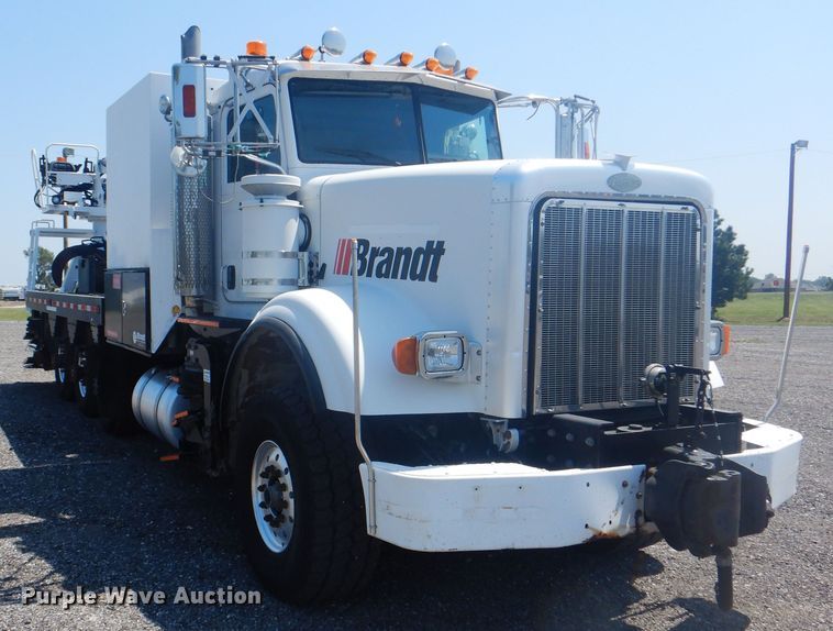 image for item KW9066 2006 Peterbilt 357  tri-drive crane truck