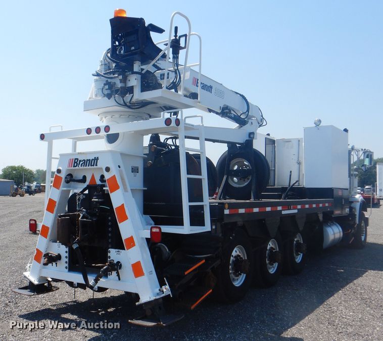 image for item KW9066 2006 Peterbilt 357  tri-drive crane truck