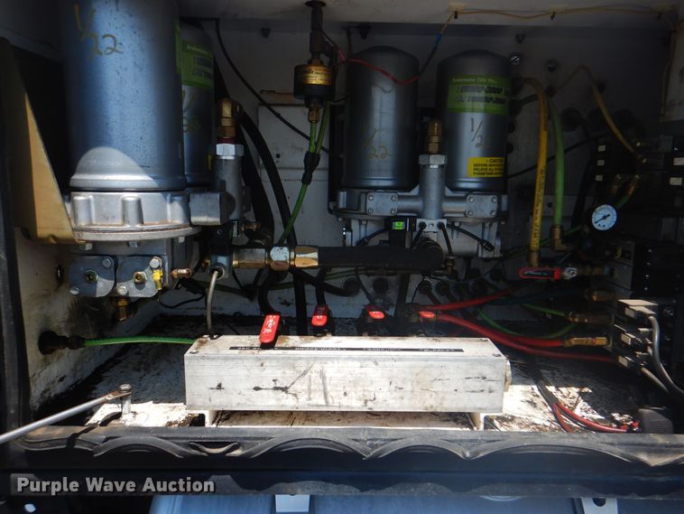 image for item KW9066 2006 Peterbilt 357  tri-drive crane truck