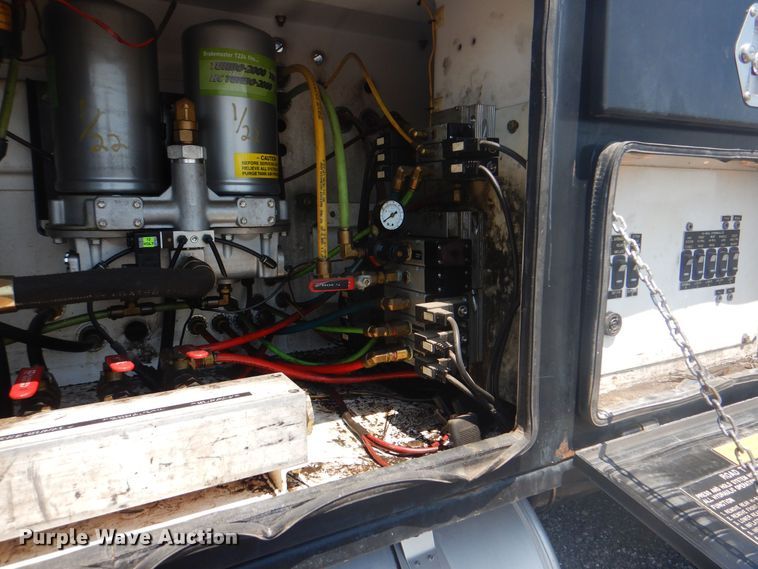 image for item KW9066 2006 Peterbilt 357  tri-drive crane truck