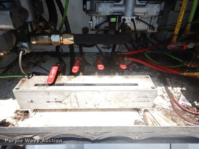 image for item KW9066 2006 Peterbilt 357  tri-drive crane truck