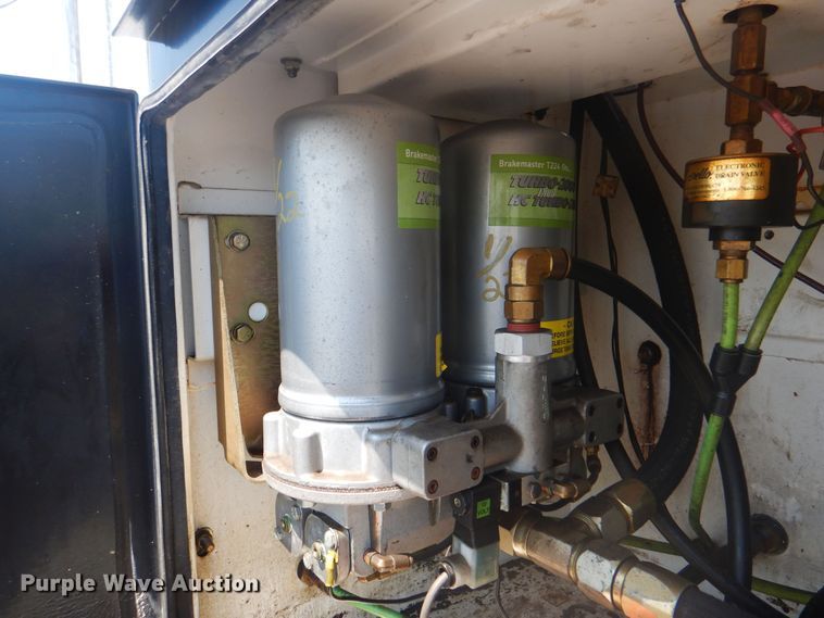 image for item KW9066 2006 Peterbilt 357  tri-drive crane truck