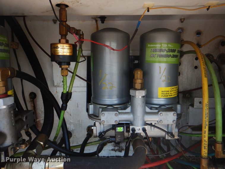 image for item KW9066 2006 Peterbilt 357  tri-drive crane truck