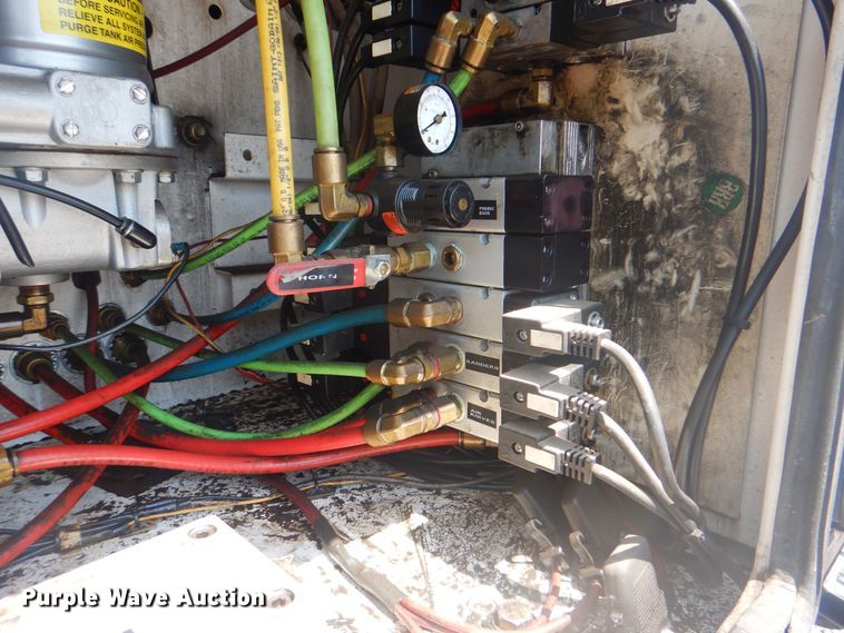 image for item KW9066 2006 Peterbilt 357  tri-drive crane truck