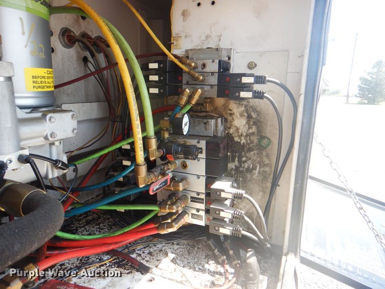 image for item KW9066 2006 Peterbilt 357  tri-drive crane truck