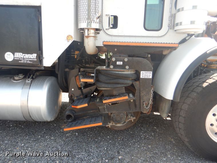 image for item KW9066 2006 Peterbilt 357  tri-drive crane truck