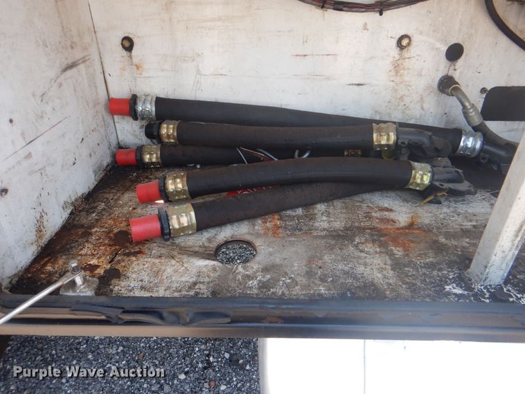 image for item KW9066 2006 Peterbilt 357  tri-drive crane truck