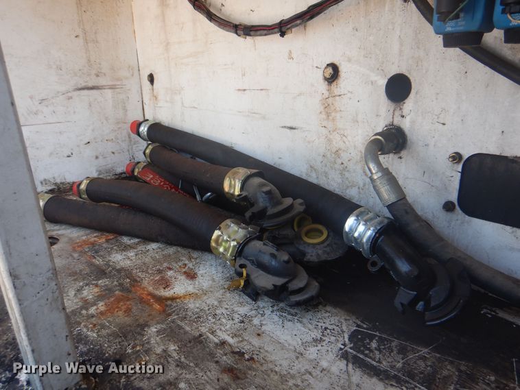 image for item KW9066 2006 Peterbilt 357  tri-drive crane truck