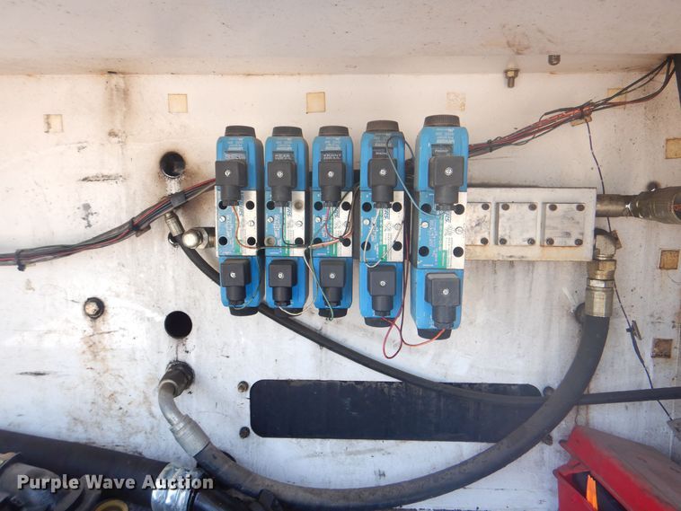 image for item KW9066 2006 Peterbilt 357  tri-drive crane truck