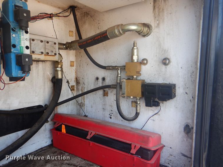 image for item KW9066 2006 Peterbilt 357  tri-drive crane truck