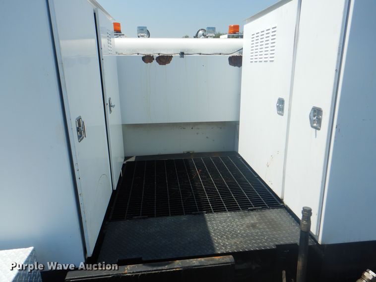 image for item KW9066 2006 Peterbilt 357  tri-drive crane truck