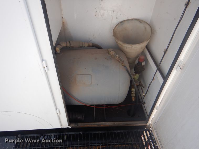 image for item KW9066 2006 Peterbilt 357  tri-drive crane truck