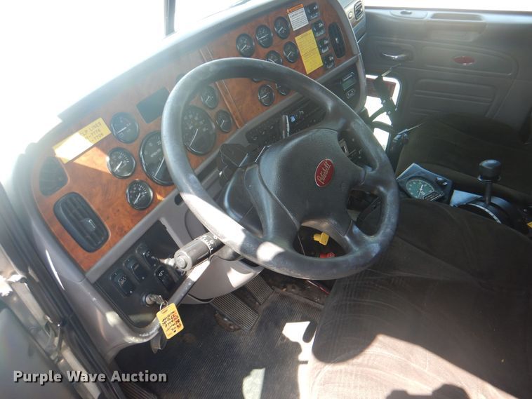 image for item KW9066 2006 Peterbilt 357  tri-drive crane truck