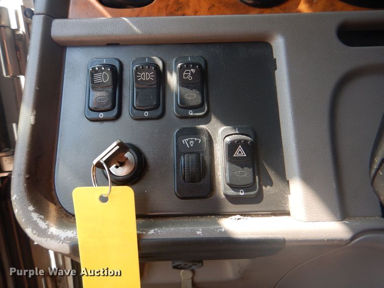 image for item KW9066 2006 Peterbilt 357  tri-drive crane truck