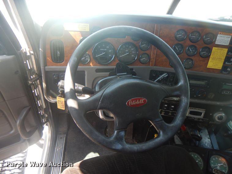 image for item KW9066 2006 Peterbilt 357  tri-drive crane truck