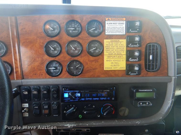 image for item KW9066 2006 Peterbilt 357  tri-drive crane truck