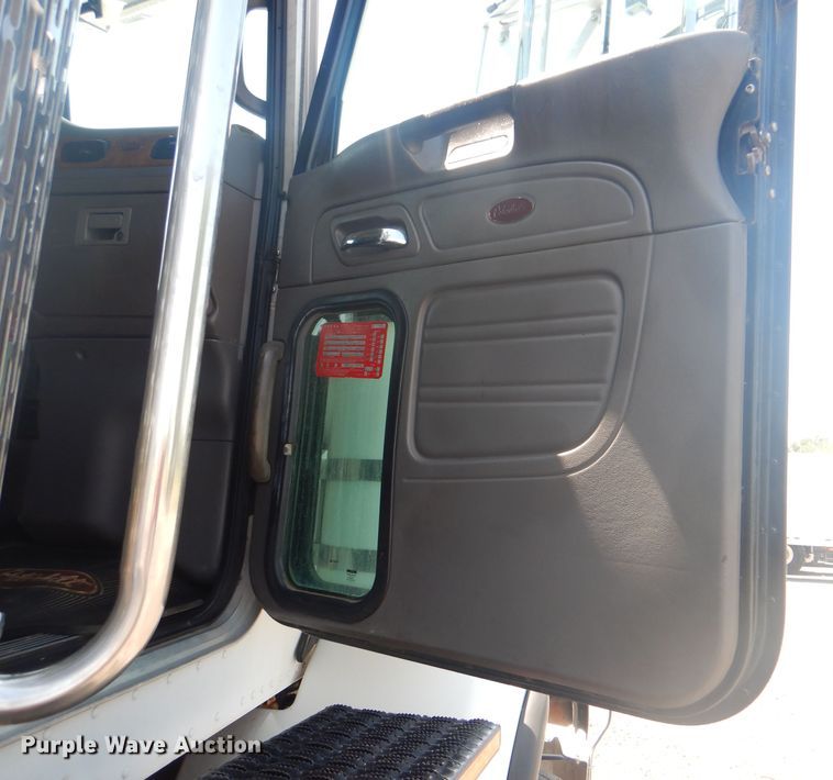 image for item KW9066 2006 Peterbilt 357  tri-drive crane truck