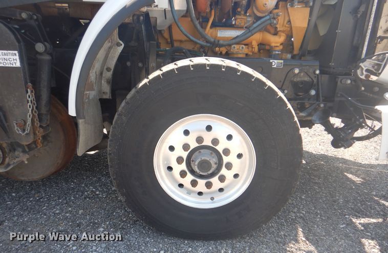 image for item KW9066 2006 Peterbilt 357  tri-drive crane truck