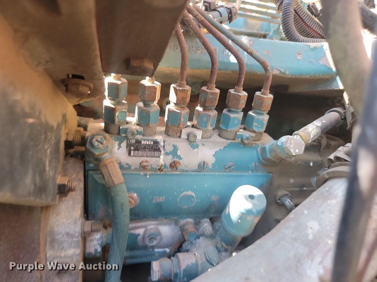 image for item LQ9238 1992 International 4700  truck with tree spade